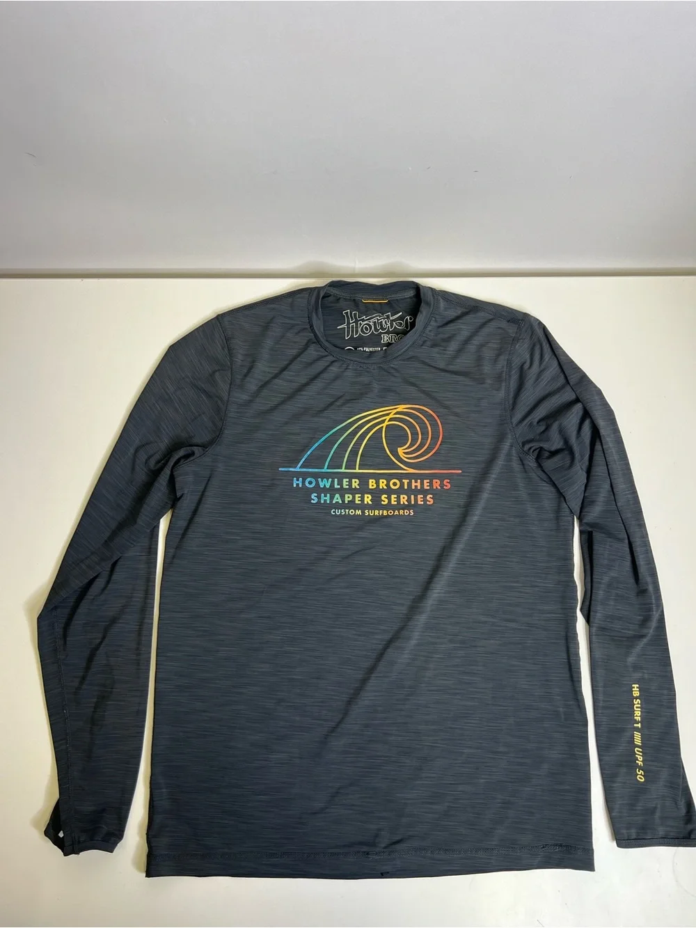 Howler Brothers Men’s Black Swim Performance Shirt with Rainbow Wave Graphic -S